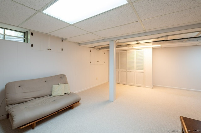 7 Indian Trl, Woodbridge, CT 06525 - basement featuring a paneled ceiling, light carpet, and baseboards