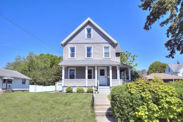 victorian house featuring a porch