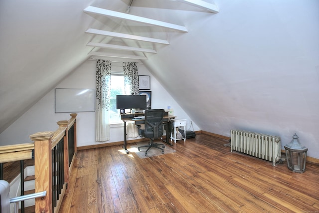 office space featuring radiator and hardwood / wood-style flooring