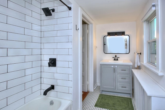 bathroom featuring shower / bathtub combination and vanity