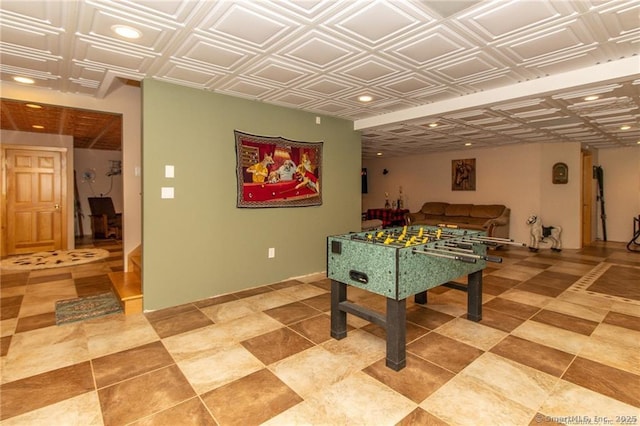 playroom featuring recessed lighting and an ornate ceiling