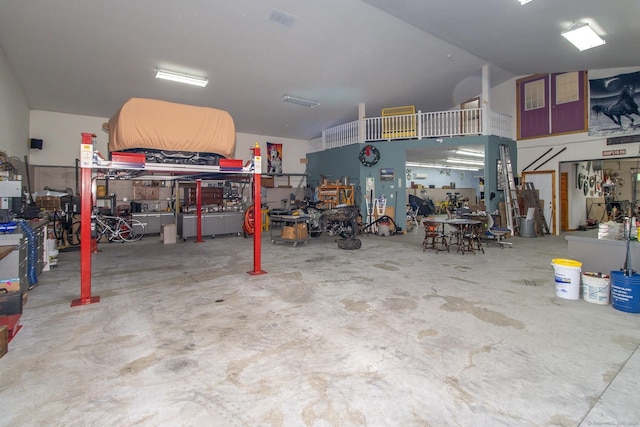 garage with a workshop area