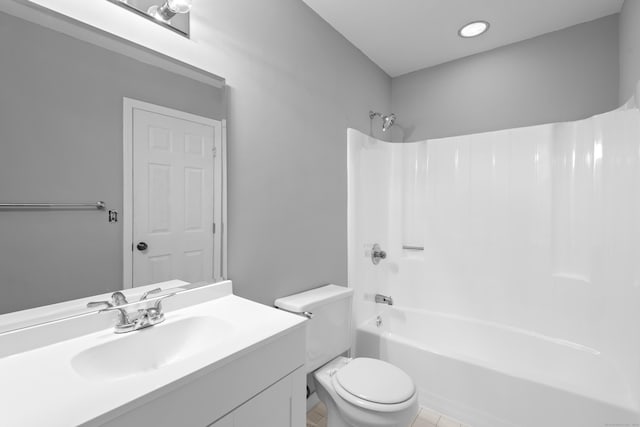 full bath with toilet, shower / tub combination, vanity, and tile patterned flooring