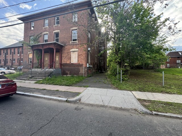 149 Wooster St, Hartford, CT 06120 - view of front of property with brick siding
