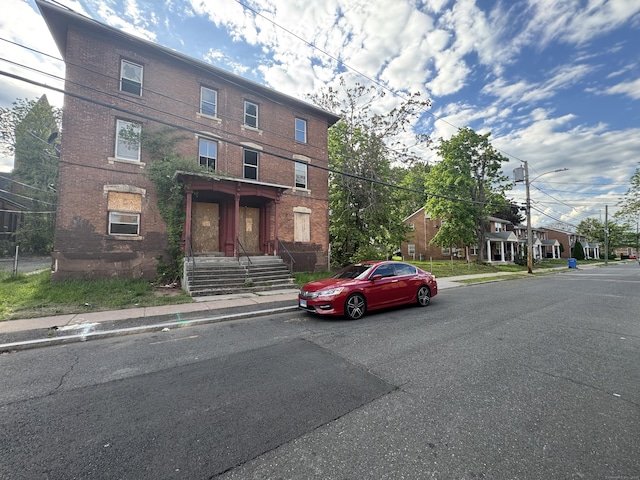 149 Wooster St, Hartford, CT 06120 - view of front facade featuring brick siding