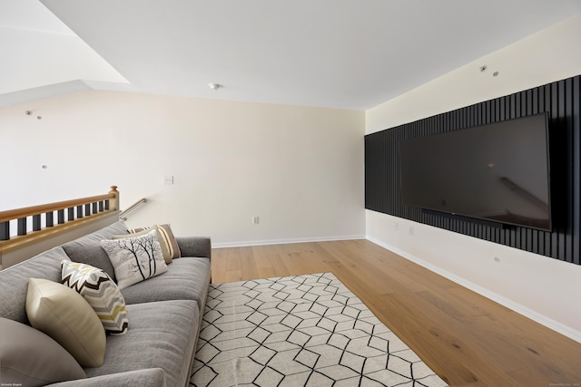 living room featuring light wood-style flooring and baseboards