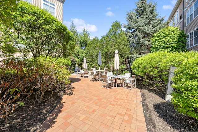 view of patio featuring outdoor dining space