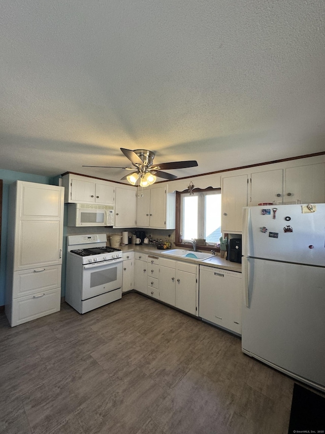 65 Dale Rd, Wethersfield, CT 06109 - kitchen with white appliances, a textured ceiling, white cabinets, ceiling fan, and light countertops