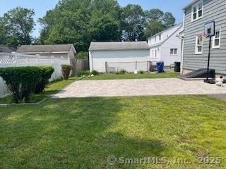 65 Dale Rd, Wethersfield, CT 06109 - view of yard with a patio