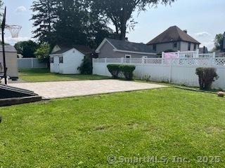 65 Dale Rd, Wethersfield, CT 06109 - view of yard with a patio area