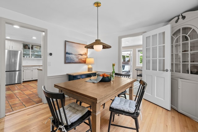 17 Fernridge Rd, West Hartford, CT 06107 - dining area with a wainscoted wall, recessed lighting, and light wood-type flooring