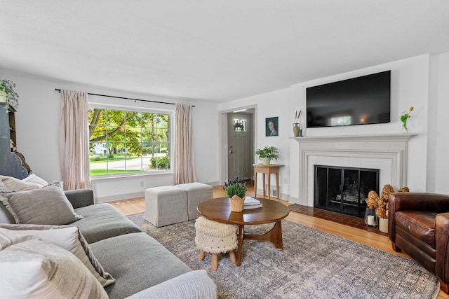 17 Fernridge Rd, West Hartford, CT 06107 - living area featuring wood finished floors and a fireplace with flush hearth