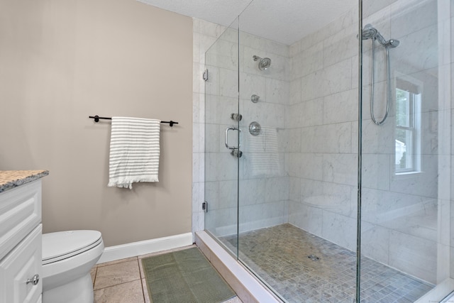 17 Fernridge Rd, West Hartford, CT 06107 - full bath with a shower stall, toilet, tile patterned floors, vanity, and baseboards