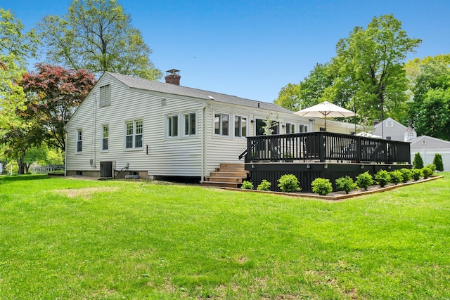 17 Fernridge Rd, West Hartford, CT 06107 - rear view of property featuring a chimney, a wooden deck, a lawn, and central air condition unit