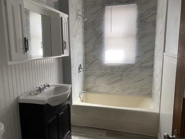 29 Cabot St, New Britain, CT 06053 - bathroom featuring bathtub / shower combination, vanity, and wood finished floors