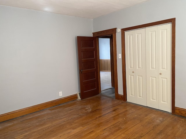 29 Cabot St, New Britain, CT 06053 - unfurnished bedroom with light wood-style floors, a closet, and baseboards