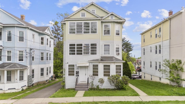 29 Cabot St, New Britain, CT 06053 - view of front of home featuring a front lawn