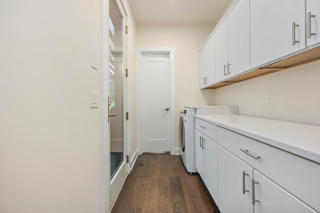 43 Hunting Ridge Rd, Greenwich, CT 06831 - washroom with dark wood-type flooring, washer and clothes dryer, and cabinet space