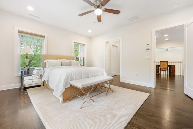 43 Hunting Ridge Rd, Greenwich, CT 06831 - bedroom with multiple windows, baseboards, dark wood-type flooring, recessed lighting, and ceiling fan