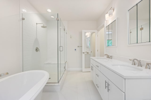 43 Hunting Ridge Rd, Greenwich, CT 06831 - full bath featuring a shower stall, a freestanding bath, double vanity, recessed lighting, and baseboards