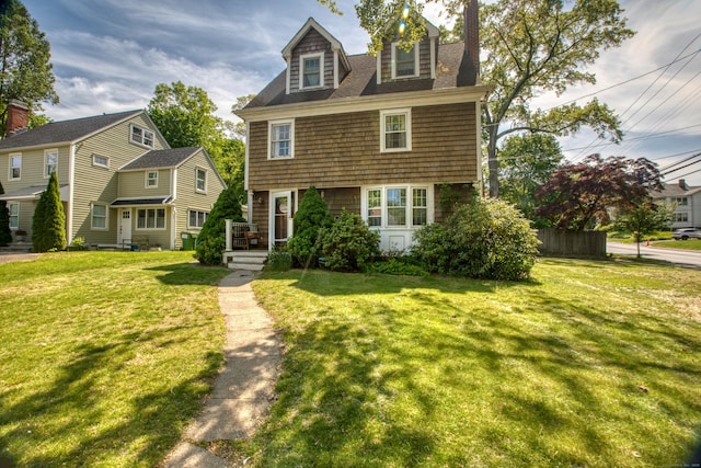 view of front of house with a front lawn