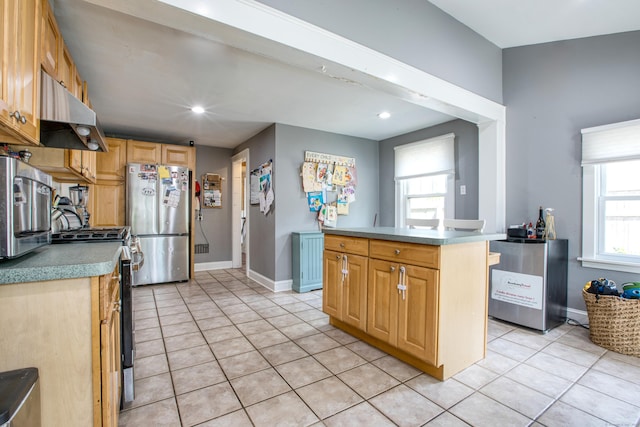 kitchen featuring stainless steel appliances, light tile patterned flooring, under cabinet range hood, baseboards, and recessed lighting