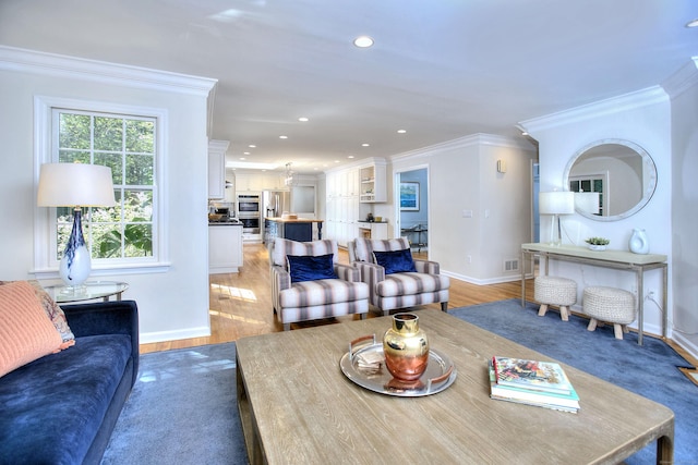81 Grumman Hill Rd, Wilton, CT 06897 - living area with baseboards, light wood-style floors, ornamental molding, and recessed lighting