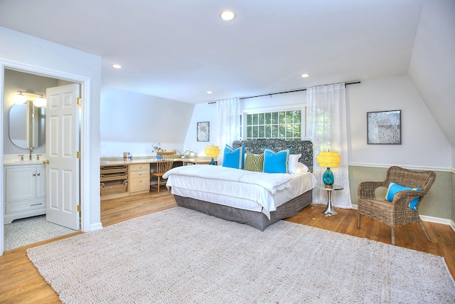 81 Grumman Hill Rd, Wilton, CT 06897 - bedroom with light wood-style flooring, recessed lighting, ensuite bathroom, baseboards, and a sink