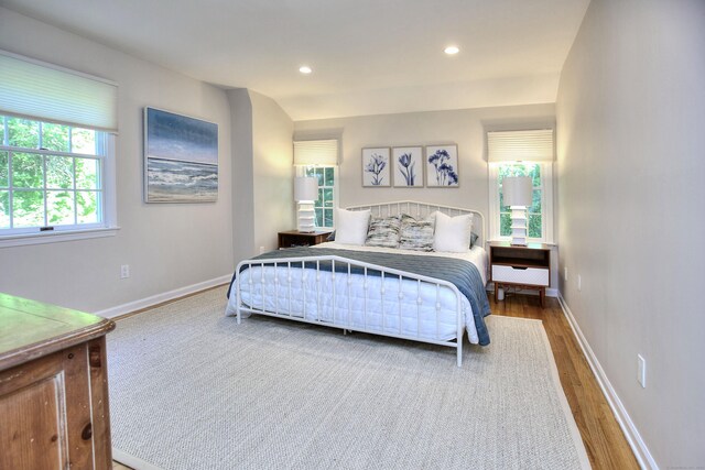 81 Grumman Hill Rd, Wilton, CT 06897 - bedroom with wood finished floors, baseboards, and recessed lighting