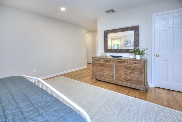 81 Grumman Hill Rd, Wilton, CT 06897 - bedroom with wood finished floors, baseboards, and recessed lighting