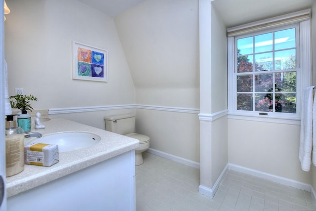 81 Grumman Hill Rd, Wilton, CT 06897 - bathroom featuring toilet, tile patterned flooring, baseboards, and vanity