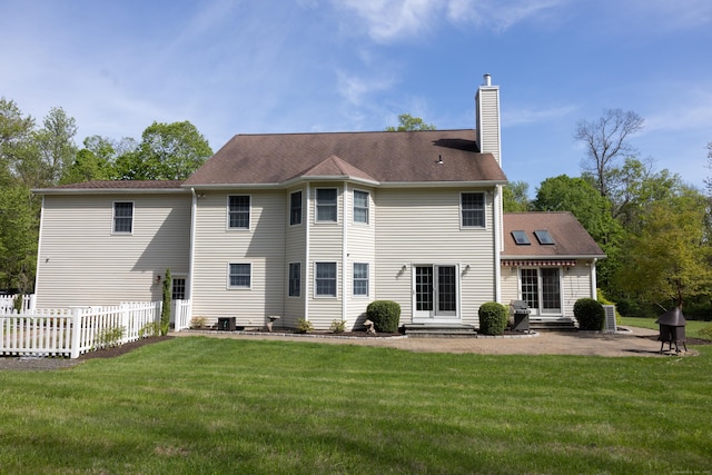 70 Wakeman Hill Rd, Sherman, CT 06784 - back of house with a chimney, entry steps, and a patio area