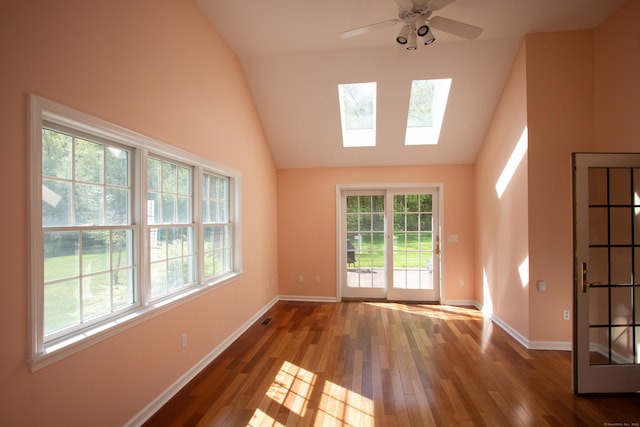 70 Wakeman Hill Rd, Sherman, CT 06784 - spare room featuring lofted ceiling, wood-type flooring, a skylight, and a ceiling fan