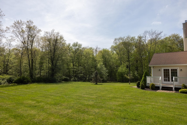 70 Wakeman Hill Rd, Sherman, CT 06784 - view of grassy yard featuring a deck and a forest view