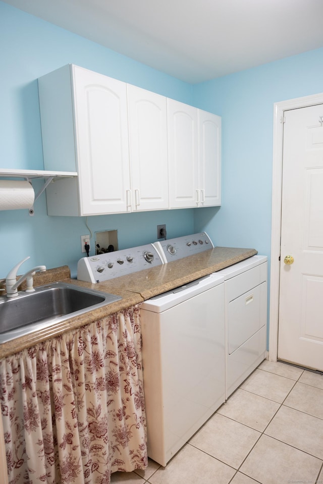 70 Wakeman Hill Rd, Sherman, CT 06784 - laundry room featuring washing machine and dryer, cabinet space, and light tile patterned floors