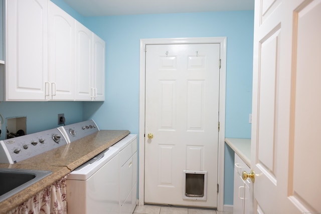 70 Wakeman Hill Rd, Sherman, CT 06784 - clothes washing area with washing machine and clothes dryer, cabinet space, and light tile patterned flooring