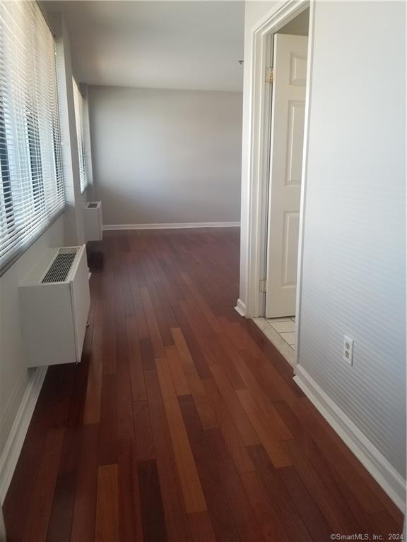300 Broad St Unit 908, Stamford, CT 06902 - hall with wood-type flooring and baseboards