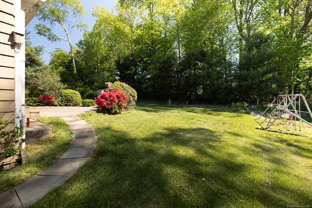 48 Lafayette Dr, Trumbull, CT 06611 - view of grassy yard featuring a playground