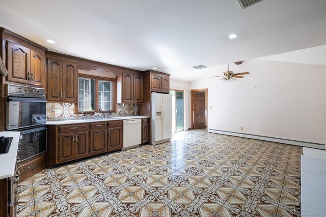 48 Lafayette Dr, Trumbull, CT 06611 - kitchen featuring white appliances, a baseboard radiator, light countertops, backsplash, and recessed lighting