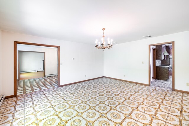 48 Lafayette Dr, Trumbull, CT 06611 - empty room with a baseboard heating unit, a chandelier, and baseboards