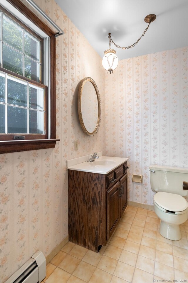 48 Lafayette Dr, Trumbull, CT 06611 - half bathroom with a baseboard radiator, vanity, tile patterned floors, wallpapered walls, and toilet