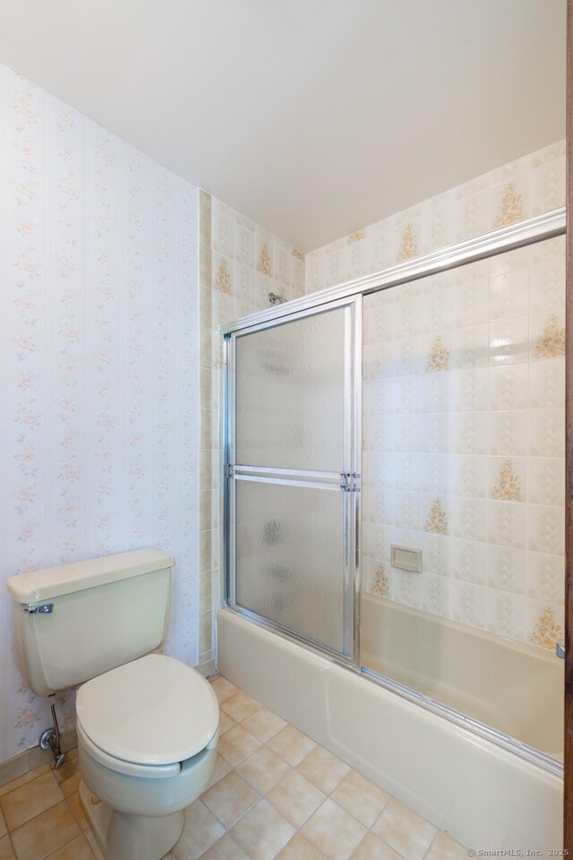 48 Lafayette Dr, Trumbull, CT 06611 - bathroom with toilet, enclosed tub / shower combo, and tile patterned floors
