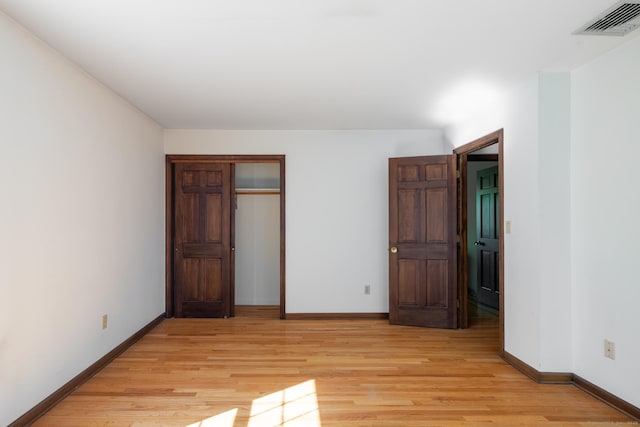48 Lafayette Dr, Trumbull, CT 06611 - unfurnished bedroom featuring light wood-style flooring, baseboards, and a closet