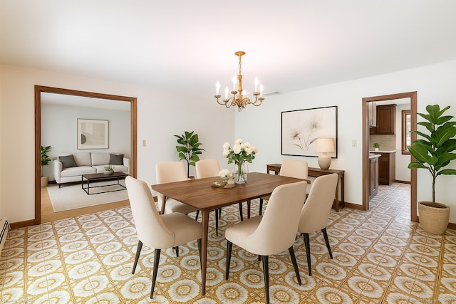 48 Lafayette Dr, Trumbull, CT 06611 - dining area with a chandelier, baseboards, and light tile patterned flooring