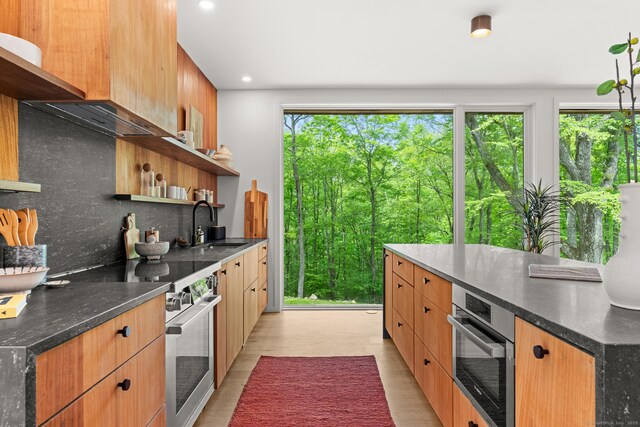 19 Old Paddock Ln, Kent, CT 06785 - kitchen featuring open shelves, a sink, stainless steel appliances, decorative backsplash, and recessed lighting