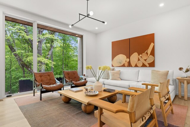 19 Old Paddock Ln, Kent, CT 06785 - living room with light wood-style flooring, a chandelier, and recessed lighting