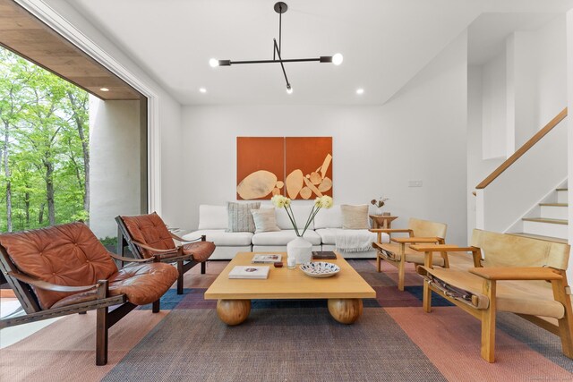 19 Old Paddock Ln, Kent, CT 06785 - living room featuring a chandelier, recessed lighting, stairs, and wood finished floors