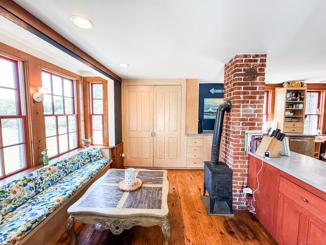 101 Child Hill Rd, Woodstock, CT 06281 - living room with hardwood / wood-style flooring, a wood stove, and recessed lighting