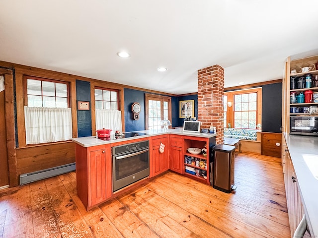 101 Child Hill Rd, Woodstock, CT 06281 - kitchen with stainless steel oven, baseboard heating, open shelves, black electric stovetop, and light countertops