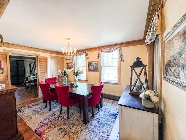 101 Child Hill Rd, Woodstock, CT 06281 - dining space featuring a chandelier, wood finished floors, baseboard heating, and baseboards